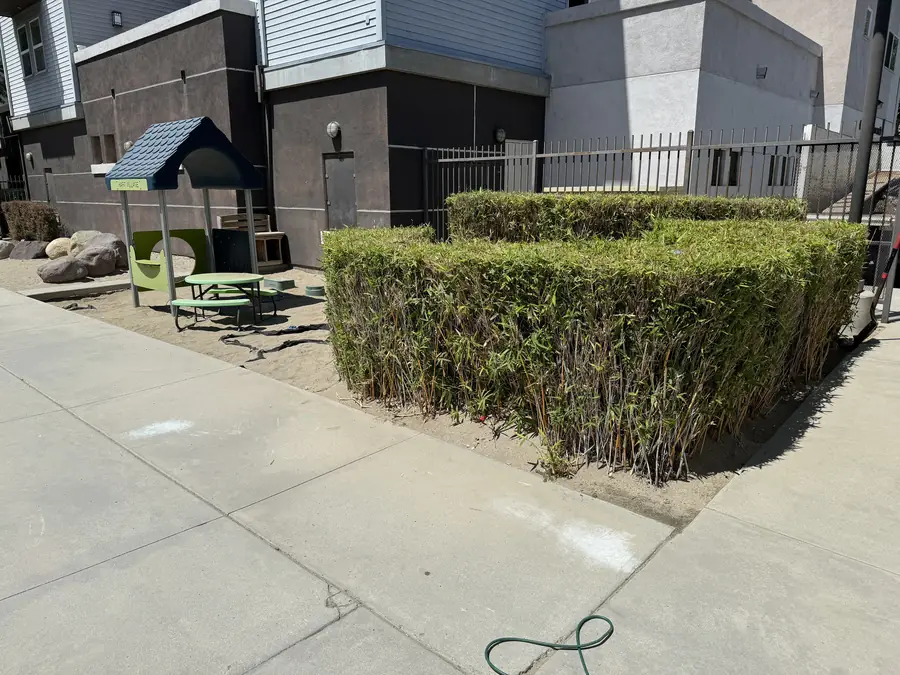 Commercial Turf, Apartment Playground in Los Angeles, CA before Daniels Landscaping started work